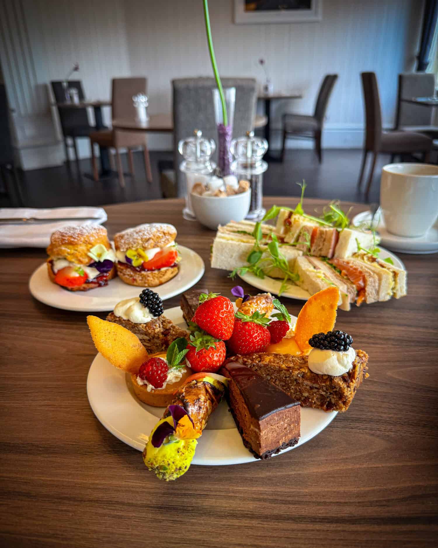 Picture of cakes and fruit on a table
