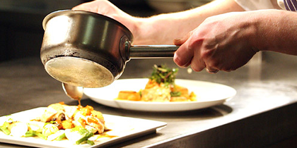 Chef plating food